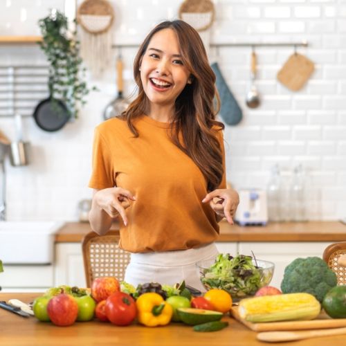 Sarah holding bell pepper