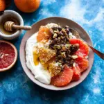 Winter Citrus Ricotta Breakfast Bowl with Honeycomb.